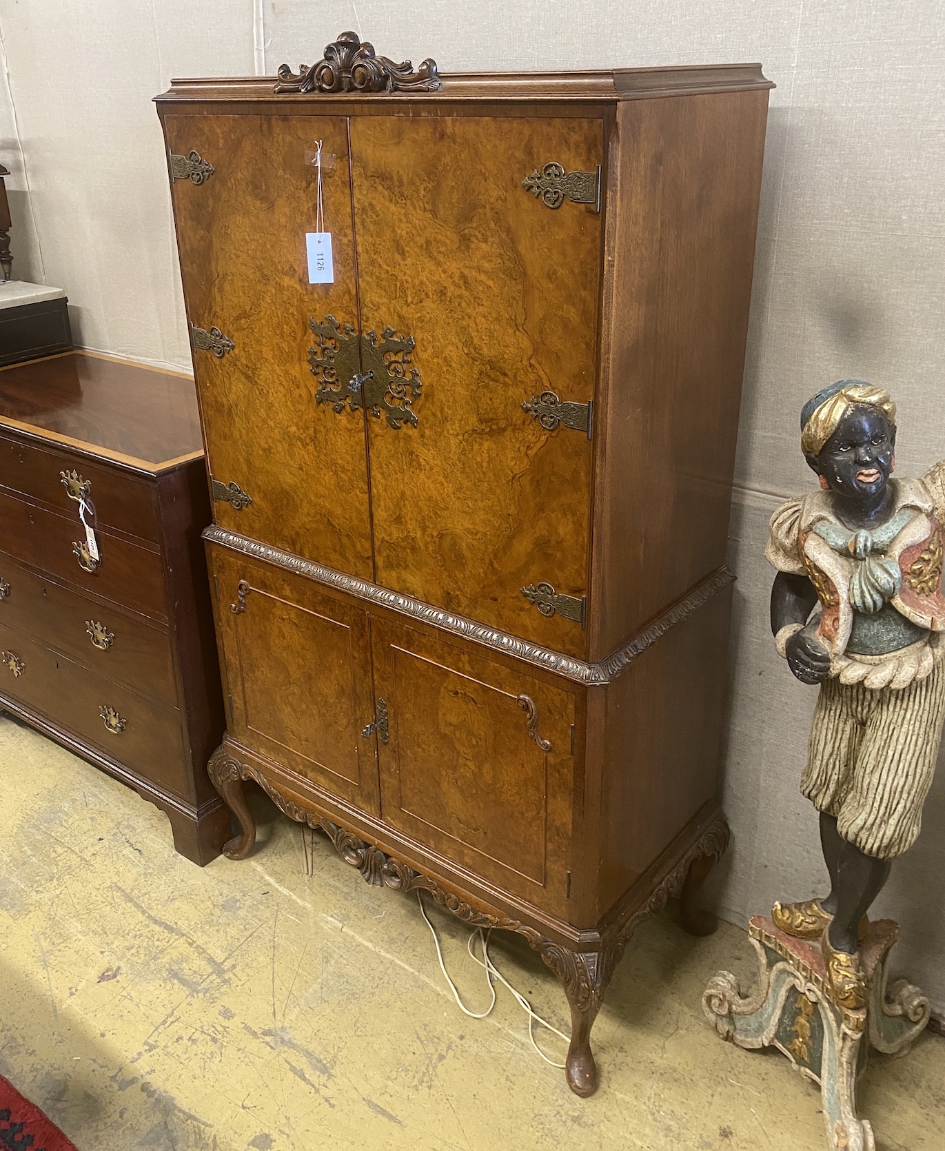 A Queen Anne revival brass mounted burr walnut cocktail cabinet, width 89cm, depth 43cm, height 160cm